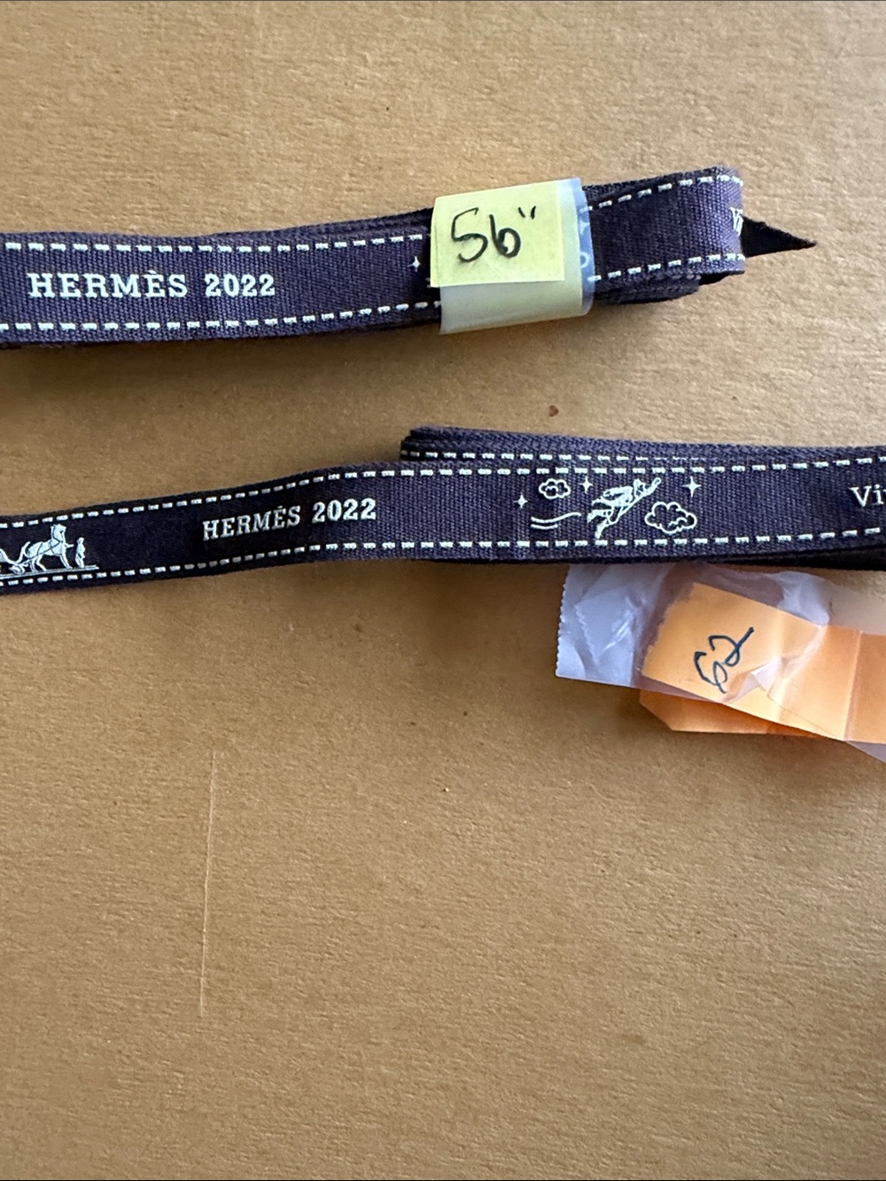Hermes Brown and White Printed Ribbon  “2022” edition  56”, 62” long.